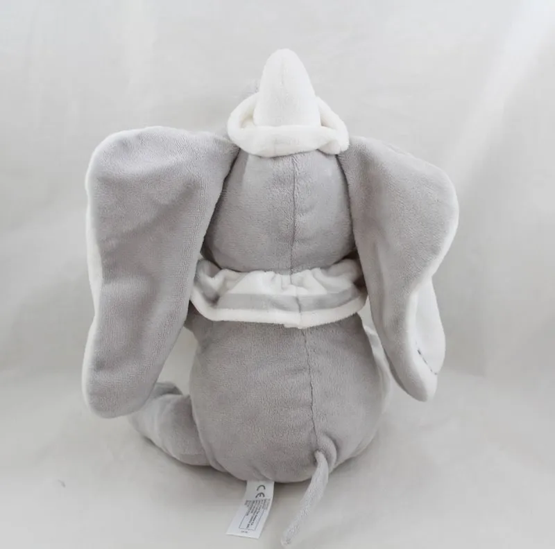 Peluche éléphant Dumbo DISNEY NICOTOY gris blanc assis coutures ore...